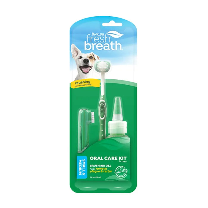 TropiClean Fresh Breath Oral Care Kit for Small & Medium Dogs in green retail packaging, showing the TripleFlex toothbrush, finger brush and brushing gel bottle.