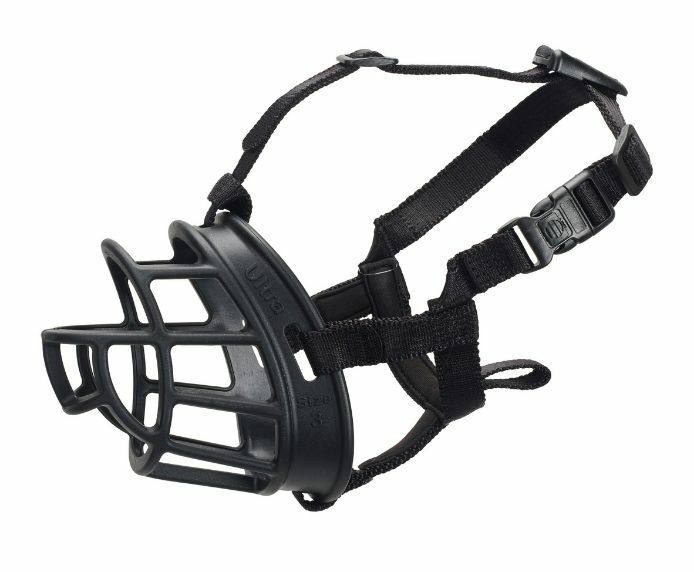 Baskerville Ultra Muzzle on a white background, showing the black TPR rubber basket and adjustable webbing straps with quick-release neck clip