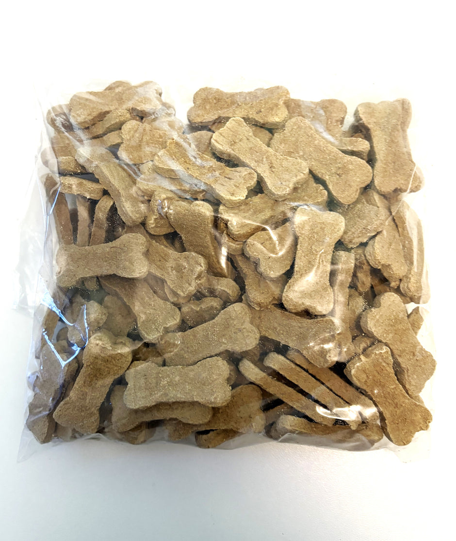 Clear bag filled with bone-shaped chicken and peanut butter dog biscuits, GoPetPlace 1kg pack