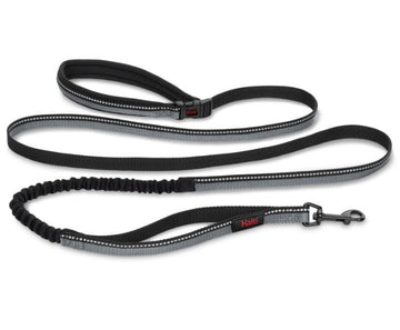 Halti Active Lead in black laid flat, showing the padded handle, bungee section, reflective strip, and trigger clip
