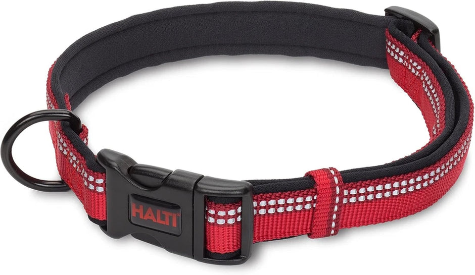 Halti Comfort Dog Collar in red, showing neoprene padding, reflective stitching, black 3-prong quick-release buckle, and metal D-ring