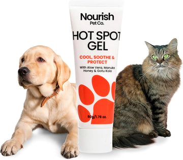 Nourish Pet Co. Hot Spot Gel 50g tube displayed between a golden labrador puppy and a tabby cat on a white background