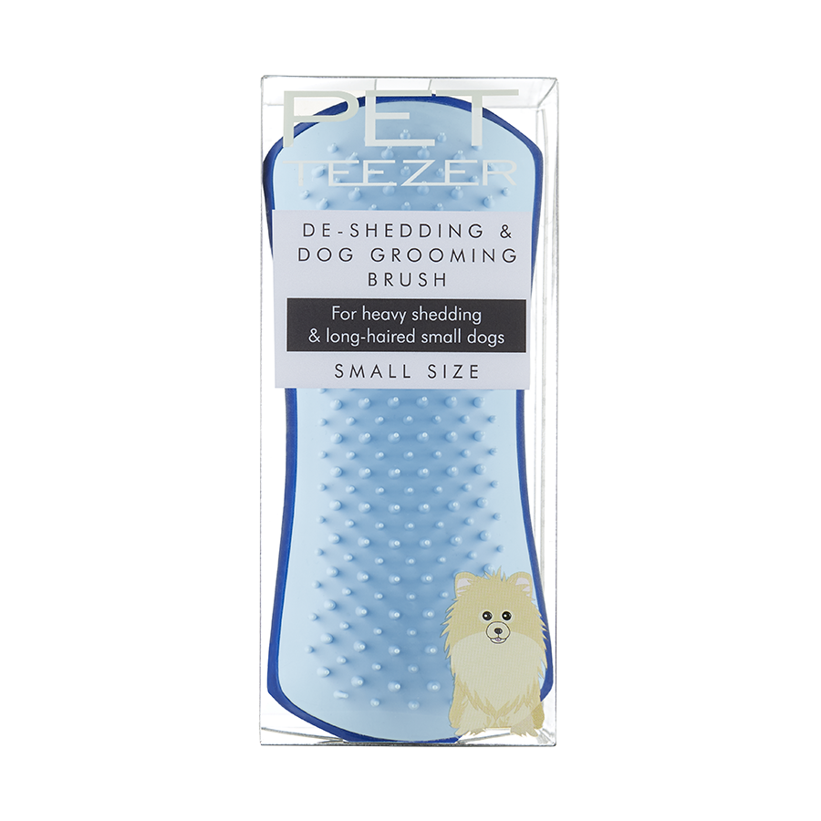 Tangle Teezer Pet Teezer De-Shedding & Dog Grooming Brush Small in blue, shown in packaging with a Pomeranian illustration and 'for heavy shedding & long-haired small dogs' callout