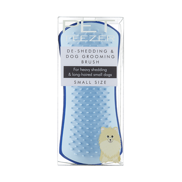 Tangle Teezer Pet Teezer De-Shedding & Dog Grooming Brush Small in blue, shown in packaging with a Pomeranian illustration and 'for heavy shedding & long-haired small dogs' callout