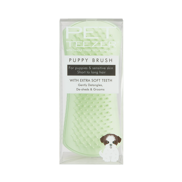 Tangle Teezer Pet Teezer Puppy Brush in green shown in its retail packaging, labelled for puppies and sensitive skin with extra soft teeth