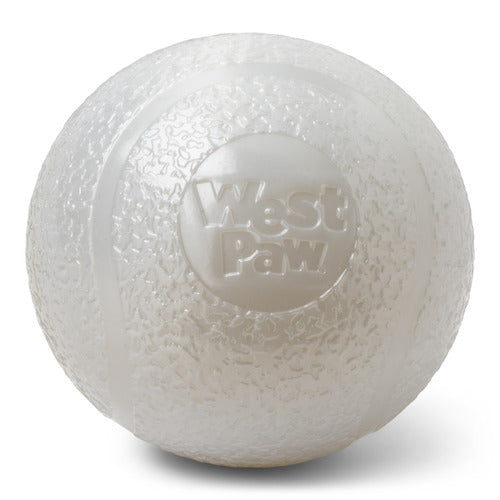West Paw Boundr large glow-in-the-dark fetch ball in pale translucent white, showing textured surface and embossed West Paw logo, on a white background.