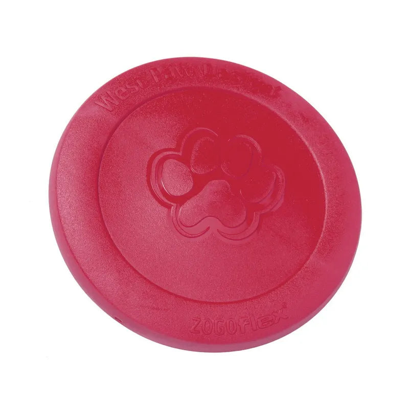 West Paw Zisc flying fetch dog toy in ruby red, showing the top of the disc with embossed paw print and Zogoflex branding, on a white background.