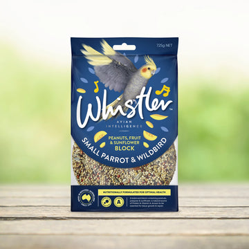 Front of Whistler Small Parrot & Wildbird Peanuts, Fruit & Sunflower Seed Block 725g package, featuring a cockatiel illustration on a navy blue background with the seed block visible at the base of the pack.