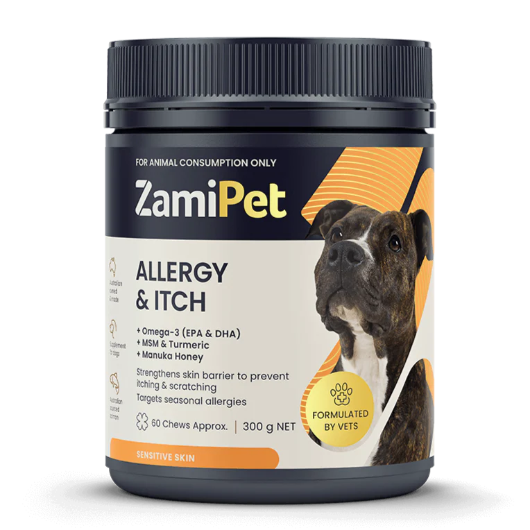 ZamiPet Allergy & Itch Supplement for Dogs — 300g tub of approximately 60 chews, featuring a Boxer dog on the label with key ingredients Omega-3, MSM, Turmeric, and Manuka Honey listed.