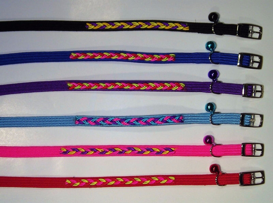Six GoPetPlace elastic stretch cat collars laid flat in black, blue, purple, sky blue, pink and red, each showing a braided decorative design and a colour-matched bell with silver buckle.