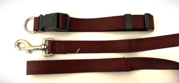 GoPetPlace 25mm burgundy dog collar with black quick-release buckle and stainless steel D ring, shown above a matching burgundy lead with metal snap clip, on a white background.