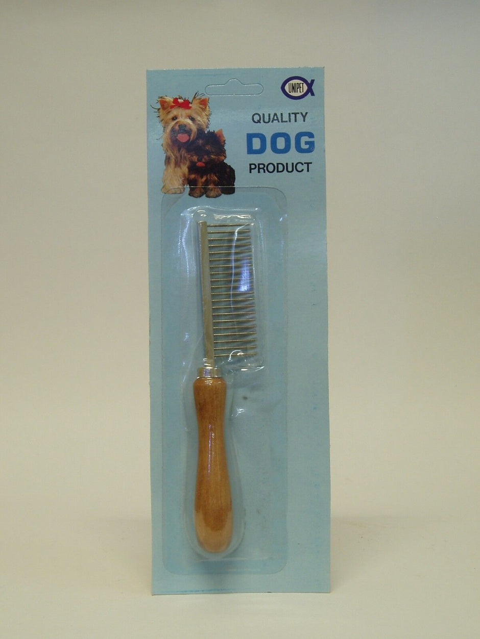 Unipet coarse pet comb with wooden handle shown in retail blister packaging, labelled Quality Dog Product, with wide-spaced metal teeth visible