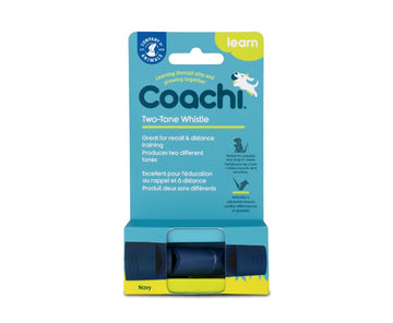 Coachi Two-Tone Whistle in navy shown in its retail packaging, highlighting two tones, recall training use, and the reflective adjustable lanyard.