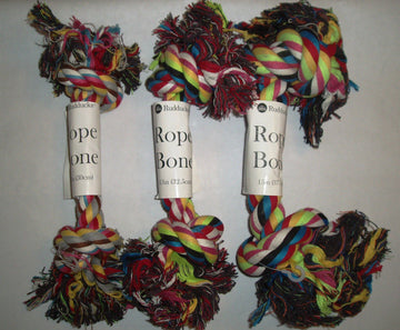 Three Rudducks multicoloured cotton rope bone dog toys in sizes 30 cm, 32.5 cm, and 37.5 cm, displayed on a light background with product labels visible.