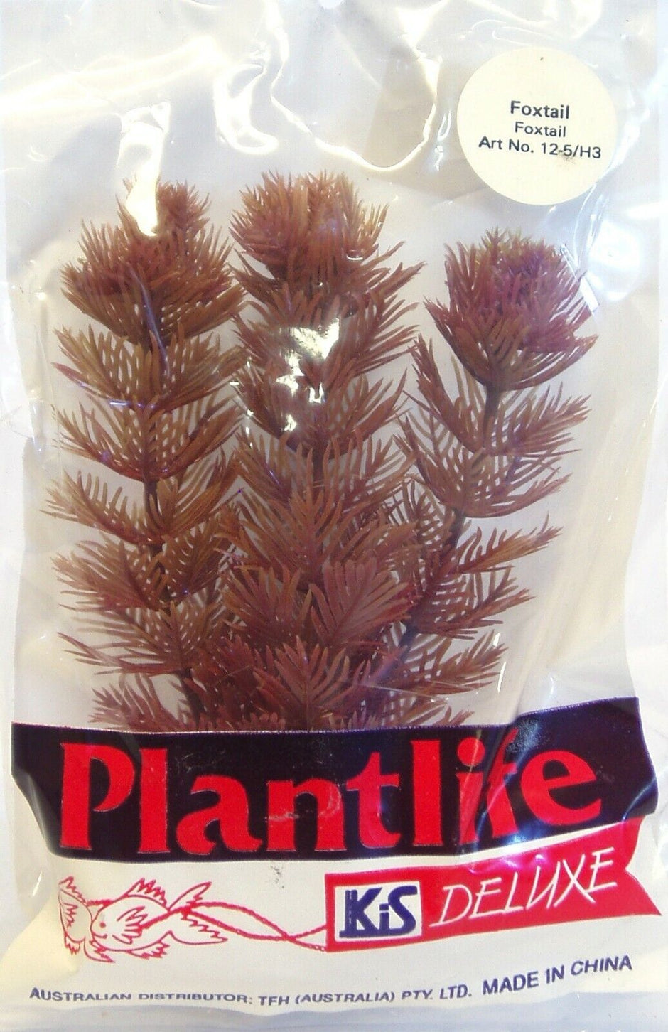 KIS Aquarium Plantlife Deluxe artificial foxtail plant in original packaging, showing the bushy reddish-brown plastic plant with foxtail-style fronds.