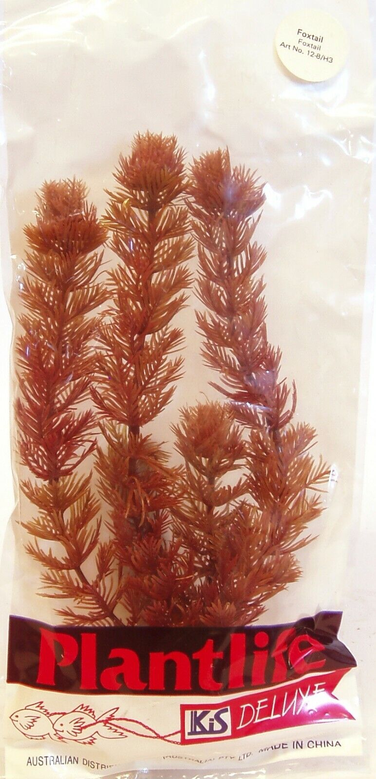 KIS Aquarium Plantlife Deluxe artificial foxtail plant in original packaging, showing reddish-brown branching foliage, approximately 8 inches tall.