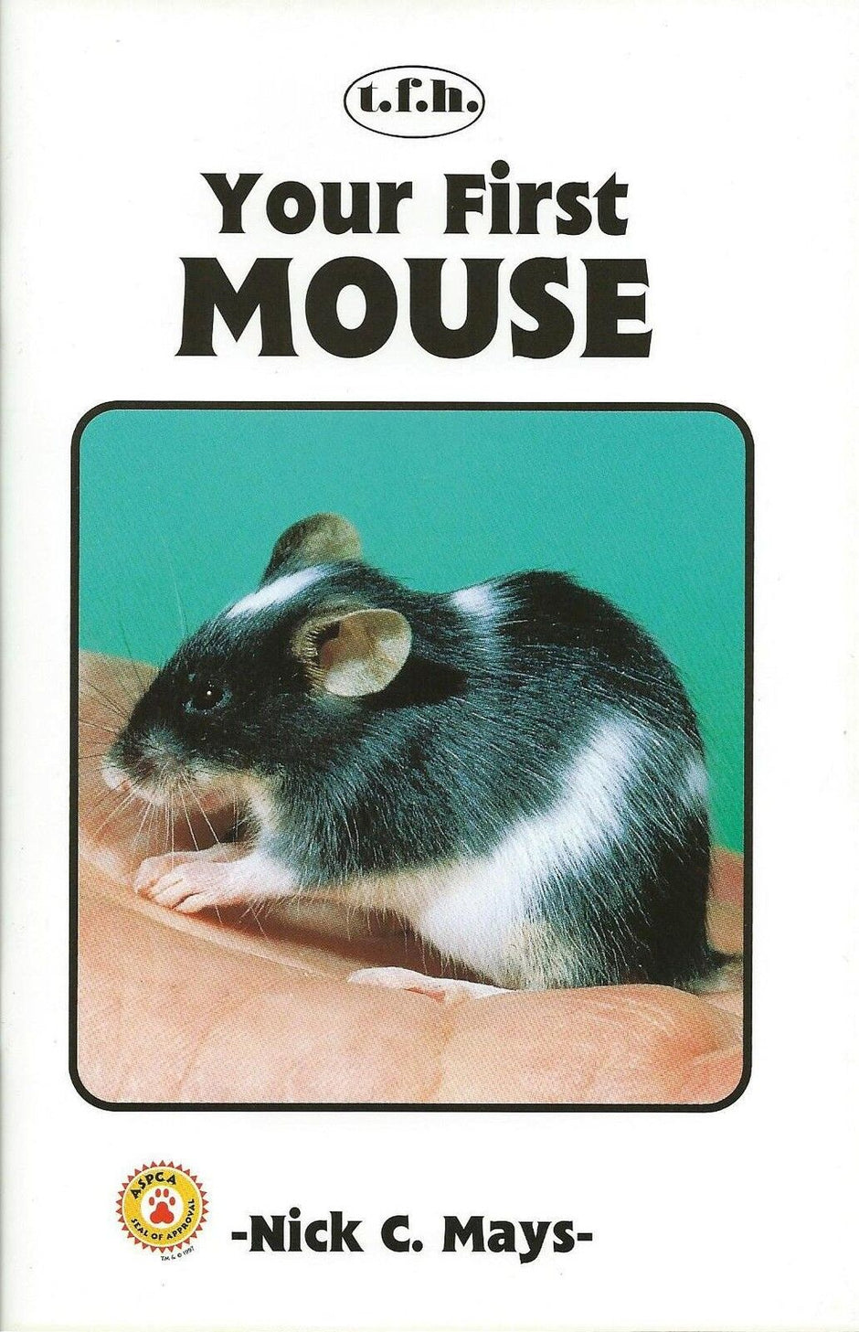 Front cover of Your First Mouse by Nick C. Mays, published by TFH, showing a black-and-white pet mouse sitting on a person's hand.