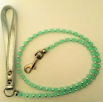 GoPetPlace 120cm beaded dog lead in mint green with silver-tone beads, a silver snap clip, and a pale textured handle loop, laid flat on a white surface.