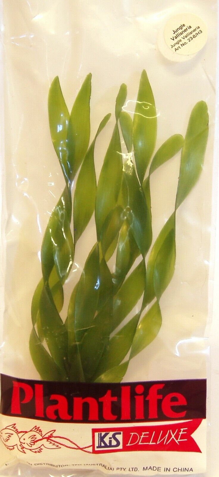 KIS Aquarium Plantlife Deluxe artificial Jungle Vallisneria plant shown in its individual clear packaging, featuring green ribbon-like plastic leaves.