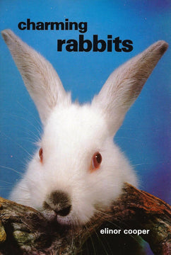 Front cover of Charming Rabbits by Elinor Cooper, showing a close-up of a white rabbit against a blue background